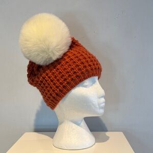 Kyi Kyi orange/pumpkin wool blend hat with faux fur pom-pom NWOT